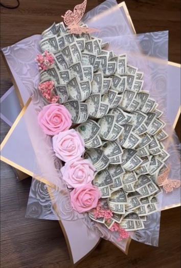 Pink rose and cash bouquet with butterfly accents
